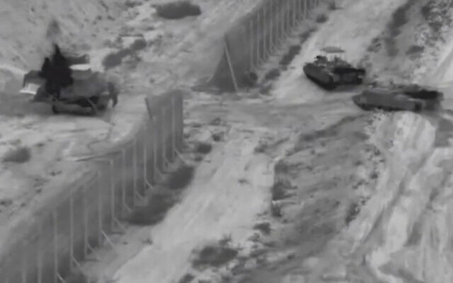 This screen grab taken from handout footage released by the Israeli army on October 26, 2023, shows tanks entering northern Gaza. (IDF / AFP) This screen grab taken from handout footage released by the Israeli army on October 26, 2023, shows tanks entering northern Gaza. (IDF / AFP)