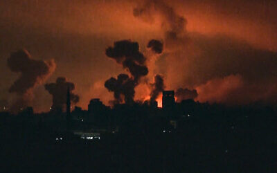 This image grab from an AFP TV footage shows fire and smoke rising above Gaza City during an Israeli strike late on October 27, 2023. (Yousef Hassouna/AFP) This image grab from an AFP TV footage shows fire and smoke rising above Gaza City during an Israeli strike late on October 27, 2023. (Yousef Hassouna/AFP)
