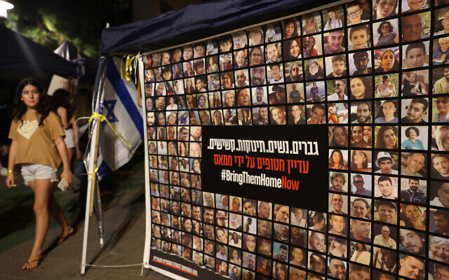 A poster shows Israelis seized by terrorists on October 7, at a press conference in Tel Aviv on October 30, 2023. (AHMAD GHARABLI / AFP) A poster shows Israelis seized by terrorists on October 7, at a press conference in Tel Aviv on October 30, 2023. (AHMAD GHARABLI / AFP)