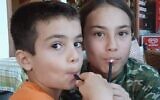 Erez and Sahar Calderon from Kibbutz Nir Oz were taken captive by Hamas terrorists on October 7, 2023, along with their father Ofer. Erez and Sahar were released on November 27, 2023. (Courtesy)