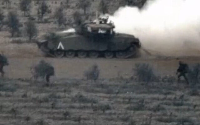 IDF tanks and infantry forces are seen operating in the northern part of the Gaza Strip, October 29, 2023. (Israel Defense Forces) IDF tanks and infantry forces are seen operating in the northern part of the Gaza Strip, October 29, 2023. (Israel Defense Forces)