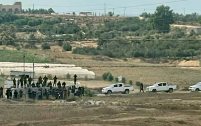 Hamas members pictured at the border a month before the terror group's October 7 onslaught. (Screenshot used in accordance with clause 27a of the Copyright Law)