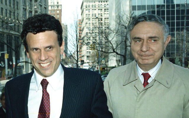 Michael Milken, left, formerly of Drexel Burnham Lambert Inc., arrives at State Supreme Court in Manhattan for his arraignment, April 7, 1989. At right is Milken's attorney Arthur Liman. (AP Photo/Gerald Herbert)