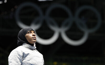 Ibtihaj Muhammad of the United States, waits for a match in the women's saber individual fencing event at the Summer Olympics in Rio de Janeiro, August 8, 2016. (Vincent Thian/AP)