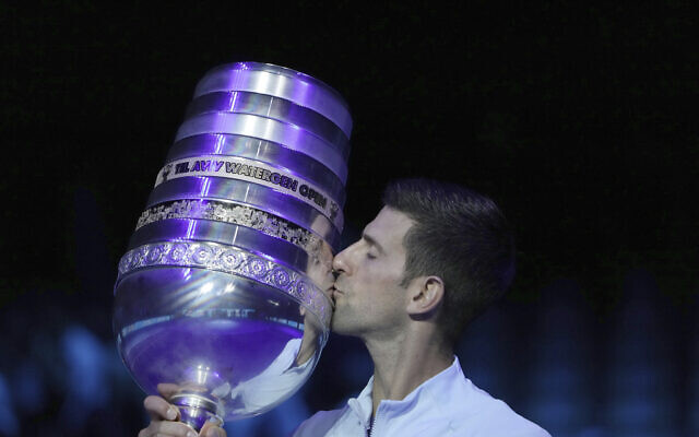 Serbia's Novak Djokovic kisses the trophy after winning the final tennis match of the ATP 250 Tel Aviv open against Croatia's Marin Cilic in Tel Aviv, Israel, Sunday, Oct. 2, 2022. (AP Photo/Ariel Schalit) Serbia's Novak Djokovic kisses the trophy after winning the final tennis match of the ATP 250 Tel Aviv open against Croatia's Marin Cilic in Tel Aviv, Israel, Sunday, Oct. 2, 2022. (AP Photo/Ariel Schalit)