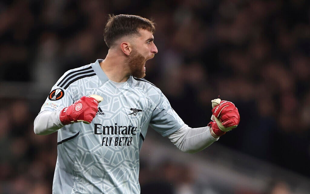 Arsenal's goalkeeper Matt Turner celebrates a goal from his teammate Granit Xhaka against PSV during the Europa League soccer match between Arsenal and PSV at Emirates stadium in London, October 20, 2022. (AP Photo/Ian Walton)