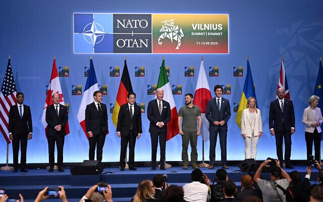 From left, Britain's Prime Minister Rishi Sunak, German Chancellor Olaf Scholz, French President Emmanuel Macron, Japan's Prime Minster Fumio Kishida, US President Joe Biden, Ukrainian President Volodymyr Zelensky, Canada's Prime Minister Justin Trudeau, Italy's Prime Minister Giorgia Meloni, European Council President Charles Michel and European Commission President Ursula von der Leyen at an event to announce a Joint Declaration of Support for Ukraineduring the NATO Summit, in Vilnius, Lithuania, Wednesday, July 12, 2023. (Paul Ellis/Pool Photo via AP) From left, Britain's Prime Minister Rishi Sunak, German Chancellor Olaf Scholz, French President Emmanuel Macron, Japan's Prime Minster Fumio Kishida, US President Joe Biden, Ukrainian President Volodymyr Zelensky, Canada's Prime Minister Justin Trudeau, Italy's Prime Minister Giorgia Meloni, European Council President Charles Michel and European Commission President Ursula von der Leyen at an event to announce a Joint Declaration of Support for Ukraineduring the NATO Summit, in Vilnius, Lithuania, Wednesday, July 12, 2023. (Paul Ellis/Pool Photo via AP)