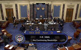 This image from U.S. Senate video shows the vote total, 88-9, on a temporary funding bill in the Senate at the US Capitol in Washington, Saturday, September 30, 2023. (Senate Television via AP)