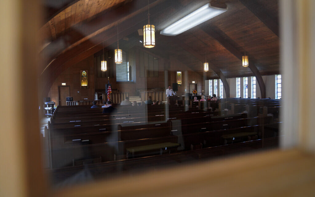 Pastor Ryan Burge, an associate professor of political science at Eastern Illinois University and author of, "The Nones," a book on the growing number of religiously unaffiliated Americans, preaches a sermon at First Baptist Church in Mt. Vernon, Illinois, September 10, 2023. (AP Photo/Jessie Wardarski) Pastor Ryan Burge, an associate professor of political science at Eastern Illinois University and author of, "The Nones," a book on the growing number of religiously unaffiliated Americans, preaches a sermon at First Baptist Church in Mt. Vernon, Illinois, September 10, 2023. (AP Photo/Jessie Wardarski)