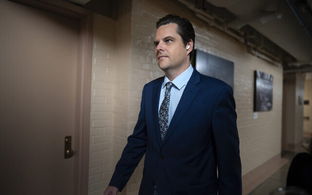 Rep. Matt Gaetz, R-Fla., walks through a basement corridor to a closed-door meeting with House Republicans on the morning after he filed a motion to strip Speaker of the House Kevin McCarthy, R-Calif., from his leadership role, at the Capitol in Washington, Tuesday, Oct. 3, 2023. (AP Photo/J. Scott Applewhite)