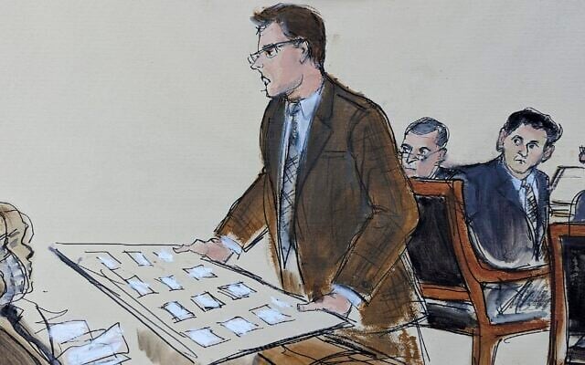 In this courtroom sketch, FTX founder Sam Bankman-Fried, second from right, seated at defense table, looks behind as Courtroom Deputy Andrew Mohan, center, holds a seating diagram while announcing the jury's seating order for Bankman-Fried's fraud trial, Tuesday, Oct. 3, 2023, in New York. (AP Photo/Elizabeth Williams) In this courtroom sketch, FTX founder Sam Bankman-Fried, second from right, seated at defense table, looks behind as Courtroom Deputy Andrew Mohan, center, holds a seating diagram while announcing the jury's seating order for Bankman-Fried's fraud trial, Tuesday, Oct. 3, 2023, in New York. (AP Photo/Elizabeth Williams)
