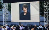 A photograph of US senator Dianne Feinstein is flashed on a screen during a memorial service in her honor, October 5, 2023, in San Francisco. (AP Photo/Godofredo A. Vásquez)
