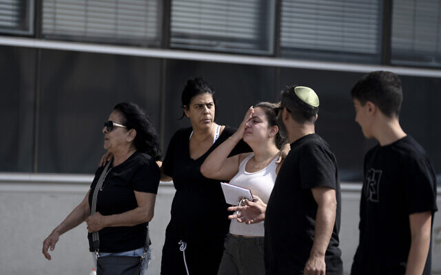 A family arrives to a police station in Lod, to provide DNA samples to help identify a relative missing since an unprecedented mass terror attack by Hamas, in southern Israel, October 8, 2023. (AP Photo/Maya Alleruzzo) A family arrives to a police station in Lod, to provide DNA samples to help identify a relative missing since an unprecedented mass terror attack by Hamas, in southern Israel, October 8, 2023. (AP Photo/Maya Alleruzzo)