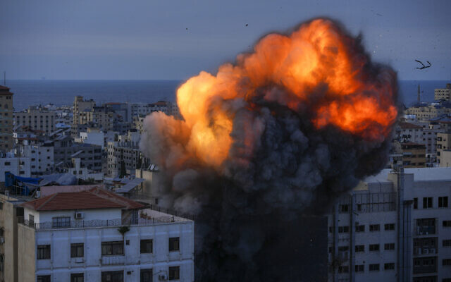 Fire and smoke rise following an Israeli airstrike, in Gaza City, October 8, 2023. (AP Photo/ Hatem Moussa)