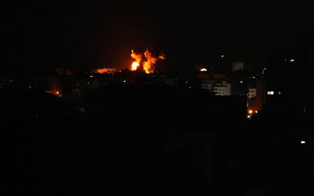 Fire and smoke rise from an explosion following an Israeli air strike in Gaza City, October 8, 2023. (AP Photo/Adel Hana)