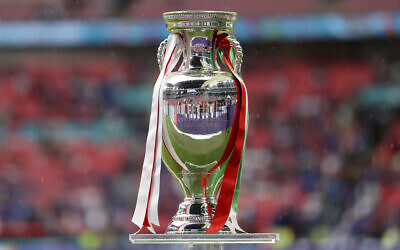 File: The trophy is displayed on the pitch before the Euro 2020 soccer championship final match between England and Italy at Wembley stadium in London, July 11, 2021. (Carl Recine/Pool Photo via AP)