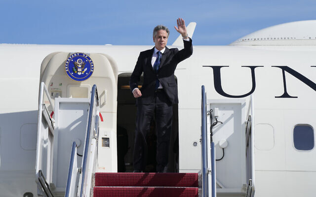 US Secretary of State Antony Blinken waves as he boards a plane, October 11, 2023, at Andrews Air Force Base, Maryland, en route to Israel. (AP Photo/Jacquelyn Martin, Pool) US Secretary of State Antony Blinken waves as he boards a plane, October 11, 2023, at Andrews Air Force Base, Maryland, en route to Israel. (AP Photo/Jacquelyn Martin, Pool)