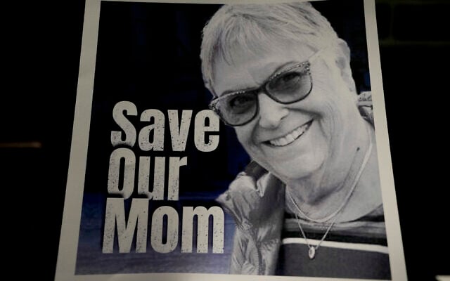 A poster of Ada Sagi, 75-year-old mother of Noam Sagi, is on display at a press conference of British children of Israeli hostages at a hotel in London, October 12, 2023. Noam Sagi, 53, is a London-based psychotherapist who grew up on Kibbutz Nir Oz. His 75-year-old mother, Ada Sagi, was taken hostage on October 7. Sharon Lifschitz, 52, is an artist and academic whose parents are peace activists aged 85 and 83 and were taken hostage too. (AP Photo/Kirsty Wigglesworth) A poster of Ada Sagi, 75-year-old mother of Noam Sagi, is on display at a press conference of British children of Israeli hostages at a hotel in London, October 12, 2023. Noam Sagi, 53, is a London-based psychotherapist who grew up on Kibbutz Nir Oz. His 75-year-old mother, Ada Sagi, was taken hostage on October 7. Sharon Lifschitz, 52, is an artist and academic whose parents are peace activists aged 85 and 83 and were taken hostage too. (AP Photo/Kirsty Wigglesworth)