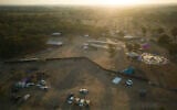 The site of a music festival near the border with the Gaza Strip is seen on October 12, 2023. At least 260 festival-goers were killed during the assault on October 7. (Erik Marmor/AP)