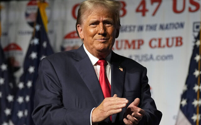 Republican presidential candidate former US president Donald Trump gestures after speaking Wednesday, Oct. 11, 2023, at Palm Beach County Convention Center in West Palm Beach, Fla. (AP Photo/Rebecca Blackwell) Republican presidential candidate former US president Donald Trump gestures after speaking Wednesday, Oct. 11, 2023, at Palm Beach County Convention Center in West Palm Beach, Fla. (AP Photo/Rebecca Blackwell)