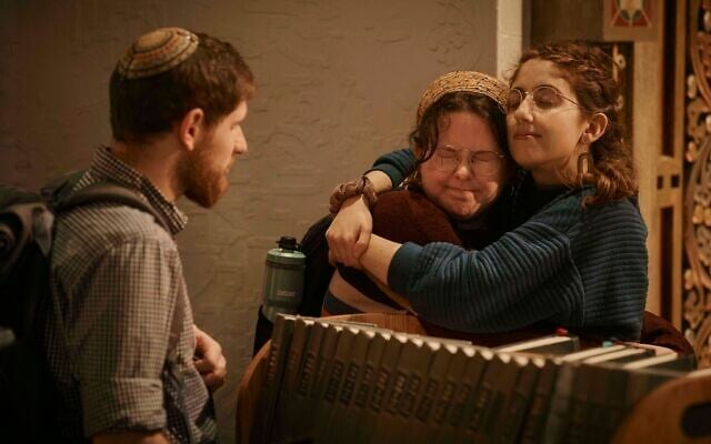 Jews hug after a communal prayer to honor and offer support for the victims in Israel at B'nai Jeshurun Synagogue on Thursday, Oct. 12, 2023, in New York. (Andres Kudacki/AP)