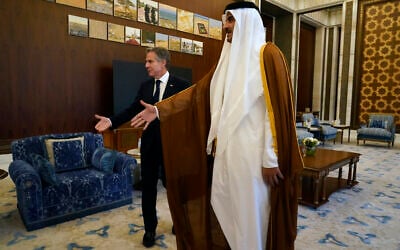 US Secretary of State Antony Blinken, left, and Qatari Emir Sheikh Tamim bin Hamad Al Thani arrive for their meeting in Lusail, Qatar, October 13, 2023. (AP Photo/Jacquelyn Martin, Pool) US Secretary of State Antony Blinken, left, and Qatari Emir Sheikh Tamim bin Hamad Al Thani arrive for their meeting in Lusail, Qatar, October 13, 2023. (AP Photo/Jacquelyn Martin, Pool)