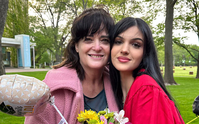 Judith Raanan, left, and her daughter Natalie, 17, after Natalie's recent high school graduation. Undated photo provided by Rabbi Meir Hecht on behalf of the Raanan family (Raanan Family via AP) Judith Raanan, left, and her daughter Natalie, 17, after Natalie's recent high school graduation. Undated photo provided by Rabbi Meir Hecht on behalf of the Raanan family (Raanan Family via AP)