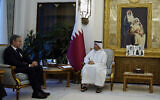 Qatar's Prime Minister and Foreign Minister Mohammed bin Abdulrahman Al Thani, right, and US Secretary of State Antony Blinken, attend a meeting, in Doha, Qatar, Oct. 13, 2023. (AP Photo/Jacquelyn Martin, Pool)