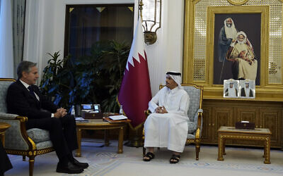 Qatar's Prime Minister and Foreign Minister Mohammed bin Abdulrahman Al Thani, right, and US Secretary of State Antony Blinken, attend a meeting, in Doha, Qatar, Oct. 13, 2023. (AP Photo/Jacquelyn Martin, Pool)