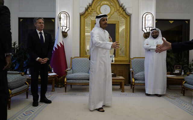 Qatar's Prime Minister and Foreign Minister Mohammed bin Abdulrahman Al Thani, center, and U.S. Secretary of State Antony Blinken, left, attend a meeting, in Doha, Qatar, Friday Oct. 13, 2023. (AP Photo/Jacquelyn Martin, Pool) Qatar's Prime Minister and Foreign Minister Mohammed bin Abdulrahman Al Thani, center, and U.S. Secretary of State Antony Blinken, left, attend a meeting, in Doha, Qatar, Friday Oct. 13, 2023. (AP Photo/Jacquelyn Martin, Pool)