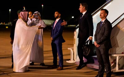 US Secretary of State Antony Blinken arrives in Riyadh, Saudi Arabia, Friday Oct. 13, 2023, and is greeted by MFA Undersecretary for Protocol Affairs Abdulmajeed Alsmari after stops in Jordan, Qatar, and Bahrain in the same day. (AP Photo/Jacquelyn Martin, Pool) US Secretary of State Antony Blinken arrives in Riyadh, Saudi Arabia, Friday Oct. 13, 2023, and is greeted by MFA Undersecretary for Protocol Affairs Abdulmajeed Alsmari after stops in Jordan, Qatar, and Bahrain in the same day. (AP Photo/Jacquelyn Martin, Pool)