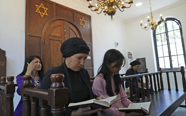 Indonesian Jews pray at Shaar Hashamayim Synagogue in Tondano, North Sulawesi, Indonesia, Saturday, Oct. 14, 2023. (AP Photo/Tatan Syuflana)
