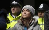 Environmental activist Greta Thunberg attends the Oily Money Out protest outside the Intercontinental Hotel, in London, Oct. 17, 2023. (AP Photo/Kin Cheung)