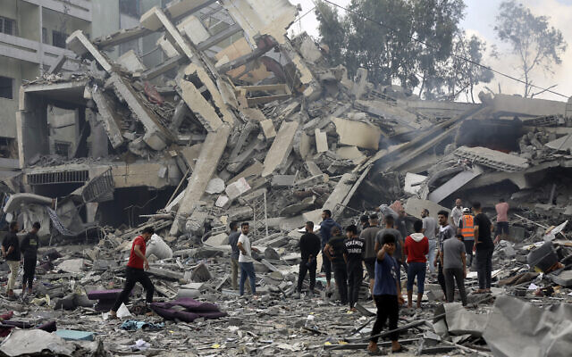 Palestinians inspect the damage of a destroyed building following Israeli airstrikes on Gaza City, Oct. 19, 2023. (AP Photo/Abed Khaled) Palestinians inspect the damage of a destroyed building following Israeli airstrikes on Gaza City, Oct. 19, 2023. (AP Photo/Abed Khaled)