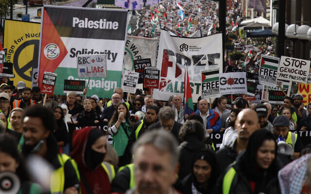 Demonstrators hold up flags and placards during a pro-Palestinian rally, amid the ongoing Israel-Hamas war, in London, October 21, 2023. (AP Photo/David Cliff) Demonstrators hold up flags and placards during a pro-Palestinian rally, amid the ongoing Israel-Hamas war, in London, October 21, 2023. (AP Photo/David Cliff)