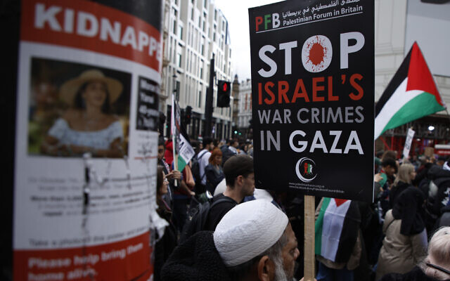 A damaged poster on a lamppost shows an image of an Israeli citizen kidnapped by terrorists from Gaza, during a pro-Palestinian demonstration in London, October 21, 2023. (AP Photo/David Cliff) A damaged poster on a lamppost shows an image of an Israeli citizen kidnapped by terrorists from Gaza, during a pro-Palestinian demonstration in London, October 21, 2023. (AP Photo/David Cliff)