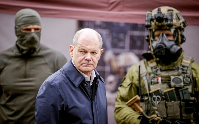 German Chancellor Olaf Scholz, center, visits the Territorial Disposition Group capability demonstration, at Cologne-Wahn military airport, in Cologne, Germany, October 23, 2023. (Kay Nietfeld/Pool via AP) German Chancellor Olaf Scholz, center, visits the Territorial Disposition Group capability demonstration, at Cologne-Wahn military airport, in Cologne, Germany, October 23, 2023. (Kay Nietfeld/Pool via AP)