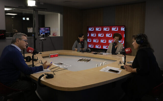 Sandrine Sebbane, programme director and journalist at RCJ, the the Radio of the Jewish Community, right, Marie-Claude Egry, clinical psychologist, second right, Stephanie Kastel, psychotherapist specialized in trauma related disorders, third right, and Philippe Levy, director of the youth action program at the FSJU, (United Jewish Social Fund) federating Jewish associations in France, speak, at RCJ radio, in Paris, Wednesday, Oct. 18, 2023. (AP Photo/Thibault Camus) Sandrine Sebbane, programme director and journalist at RCJ, the the Radio of the Jewish Community, right, Marie-Claude Egry, clinical psychologist, second right, Stephanie Kastel, psychotherapist specialized in trauma related disorders, third right, and Philippe Levy, director of the youth action program at the FSJU, (United Jewish Social Fund) federating Jewish associations in France, speak, at RCJ radio, in Paris, Wednesday, Oct. 18, 2023. (AP Photo/Thibault Camus)