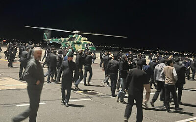 Rioters at the airport in Makhachkala, Dagestan, October 30, 2023, shout antisemitic slogans as they protest the arrival of an airliner coming from Tel Aviv. (AP)