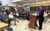 Rep. David Kustoff, right, speaks with people at Margolin Hebrew Academy-Feinstone Yeshiva of the South on Monday, Oct. 30, 2023, in Memphis, Tennessee (AP Photo/Adrian Sainz).