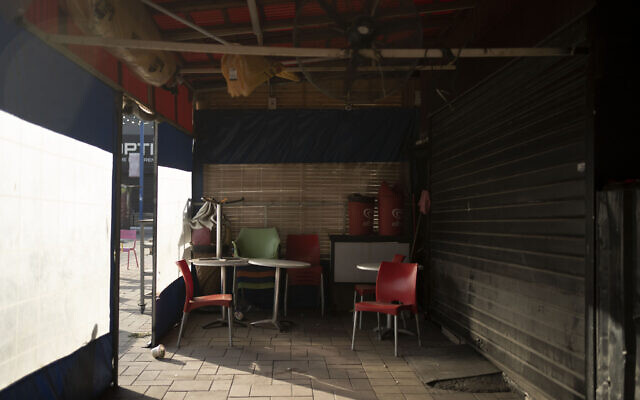 Tables and chairs at a restaurant that has closed in Sderot, Oct. 25, 2023 (AP Photo/Maya Alleruzzo) Tables and chairs at a restaurant that has closed in Sderot, Oct. 25, 2023 (AP Photo/Maya Alleruzzo)