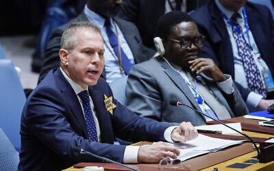 Israel’s UN Ambassador Gilad Erdan wears a yellow Star of David that reads "Never Again" in honor of those killed in the unprecedented assault by Hamas, which triggered an ongoing war, as he addresses members of the UN Security Council at United Nations headquarters October 30, 2023. (Eduardo Munoz Alvarez/AP)