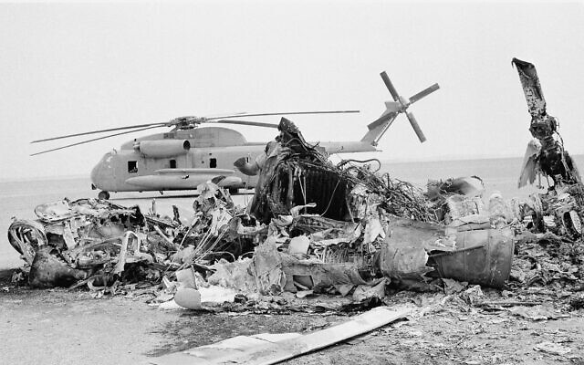 Remains of a burned-out US helicopter lies in front of abandoned chopper in the eastern desert region of Iran, April 27, 1980, one day after an abortive American commando raid to free the US Embassy hostages. (AP Photo) Remains of a burned-out US helicopter lies in front of abandoned chopper in the eastern desert region of Iran, April 27, 1980, one day after an abortive American commando raid to free the US Embassy hostages. (AP Photo)