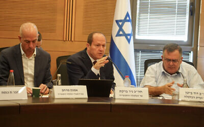 Economy Minister Nir Barkat (center) speaks at a meeting of the Knesset Economy Committee, October 25, 2023. (Courtesy)
