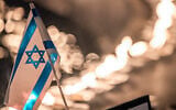 A scene from the 1300 Candle Vigil in Dizengoff Square in Tel Aviv, on October 12, 2023. (Eli Katzoff)