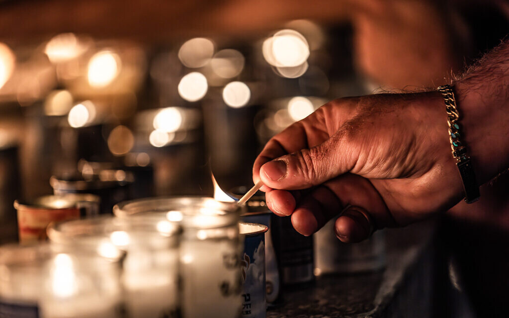 A scene from the 1300 Candle Vigil in Dizengoff Square in Tel Aviv, on October 12, 2023. (Eli Katzoff)