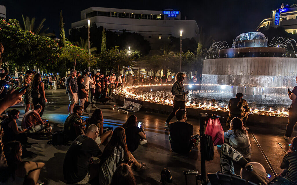 A scene from the 1300 Candle Vigil in Dizengoff Square in Tel Aviv, on October 12, 2023. (Eli Katzoff)