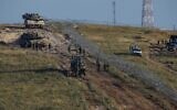 Israeli troops carry out maintenance and exposure works near the Blue Line between Israel and Lebanon, close to Misgav in northern Israel, June 12, 2023. (Ayal Margolin/Flash90)