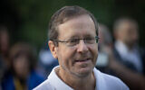 President Isaac Herzog hosts a Sukkot event for the public at his official residence in Jerusalem, October 3, 2023. (Chaim Goldbergl/Flash90)