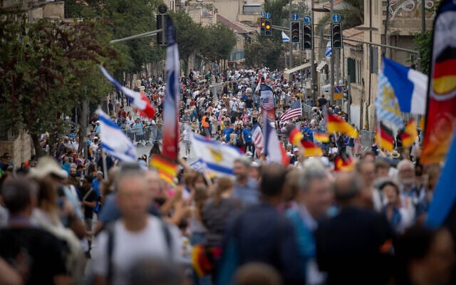 Thousands of Israelis and supporters of the Jewish state take part in the annual Jerusalem March marking the Sukkot holiday, October 4, 2023. (Chaim Goldberg/Flash90) Thousands of Israelis and supporters of the Jewish state take part in the annual Jerusalem March marking the Sukkot holiday, October 4, 2023. (Chaim Goldberg/Flash90)